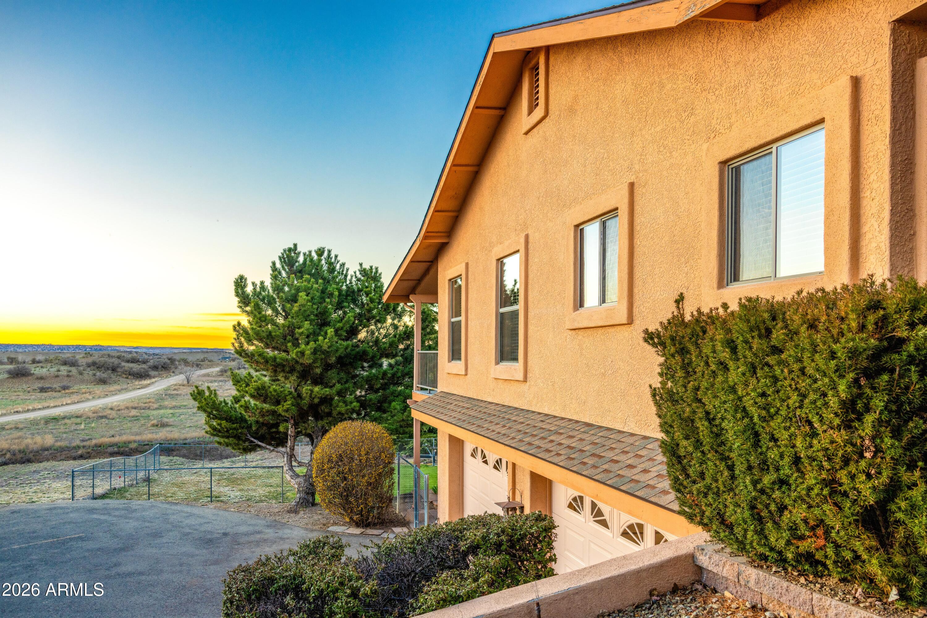 14350 East Meadow Ranch Place Dewey, AZ 86327 - Photo 42 of 54 a front view of a house with ocean view