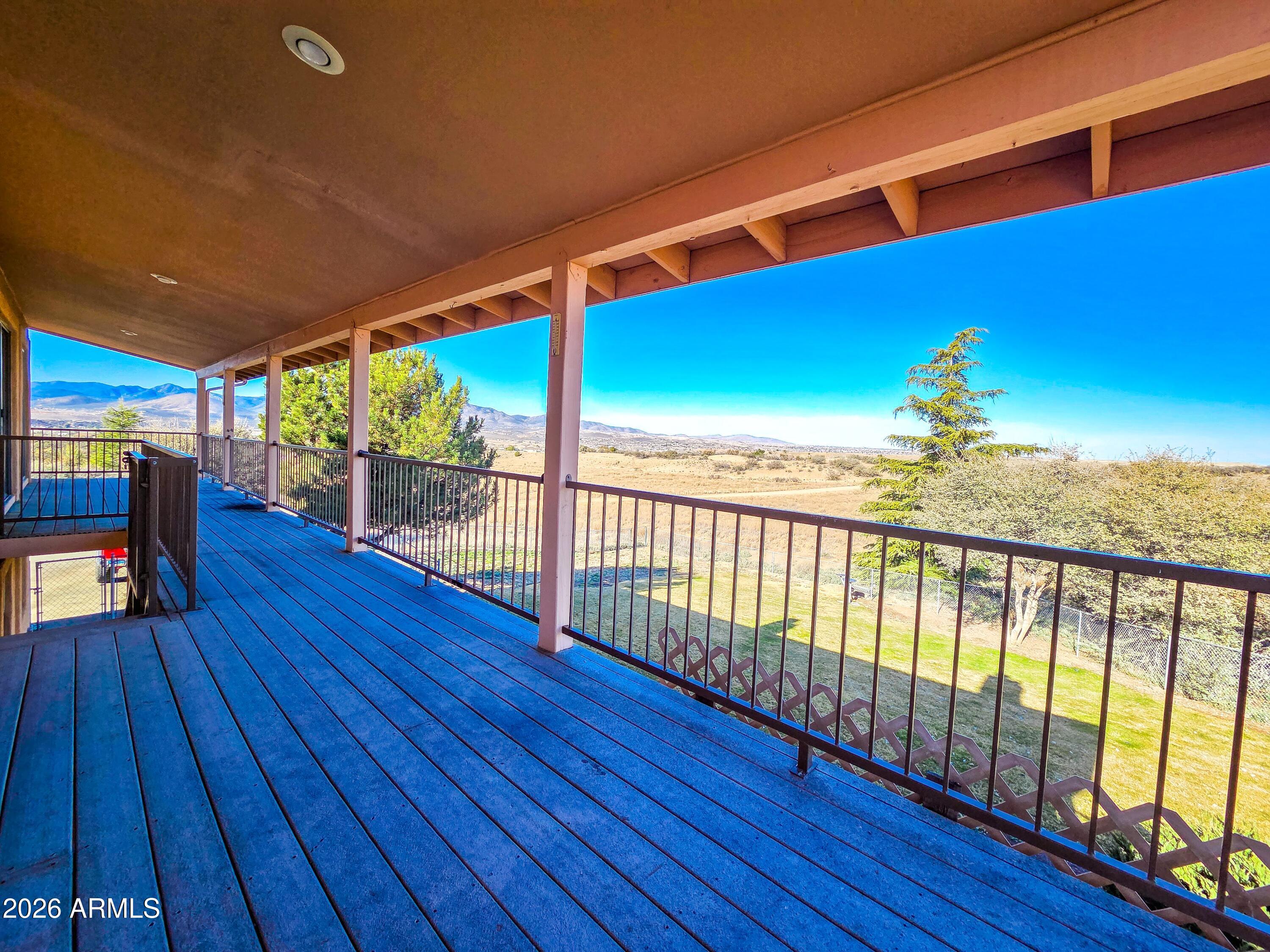 14350 East Meadow Ranch Place Dewey, AZ 86327 - Photo 47 of 54 a view of outdoor space with wooden floor and outdoor seating