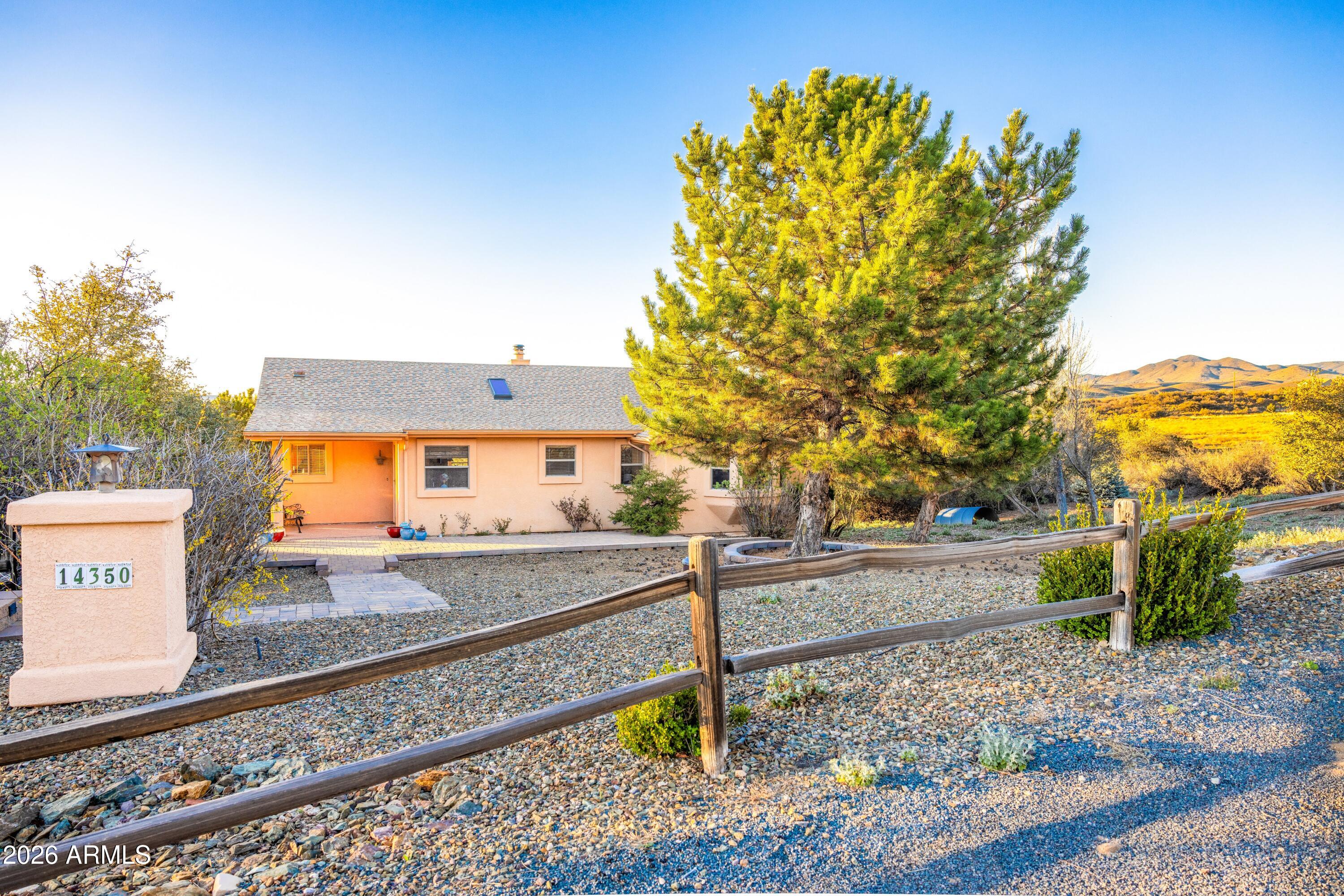 14350 East Meadow Ranch Place Dewey, AZ 86327 - Photo 7 of 54 a view of a house with a yard
