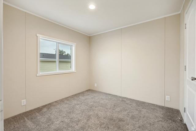 142 Cushing Way Layton, UT 84041 - Photo 9 of 15 Room featuring neutral panel walls and plush gray carpeting