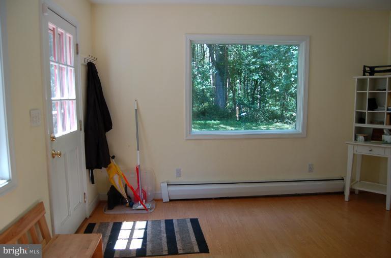 1010 Ashton Road Ashton, MD 20861 - Photo 4 of 12 a view of room with window and air conditioner