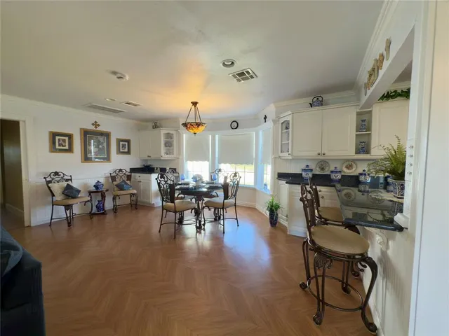 a view of a living room and dining room