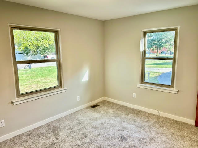 1011 Monroe Drive Bloomington, IL 61701 - Photo 16 of 25 a view of an empty room with a window