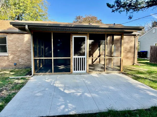 a view of a porch with a garden