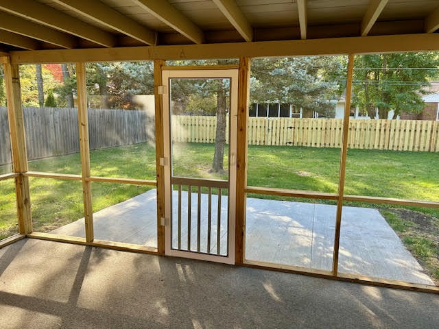1011 Monroe Drive Bloomington, IL 61701 - Photo 22 of 25 a view of a porch with a garden