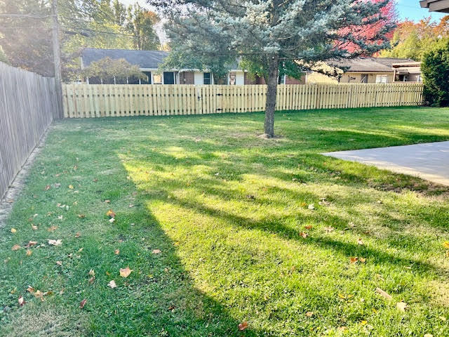 1011 Monroe Drive Bloomington, IL 61701 - Photo 25 of 25 a view of a garden with a house