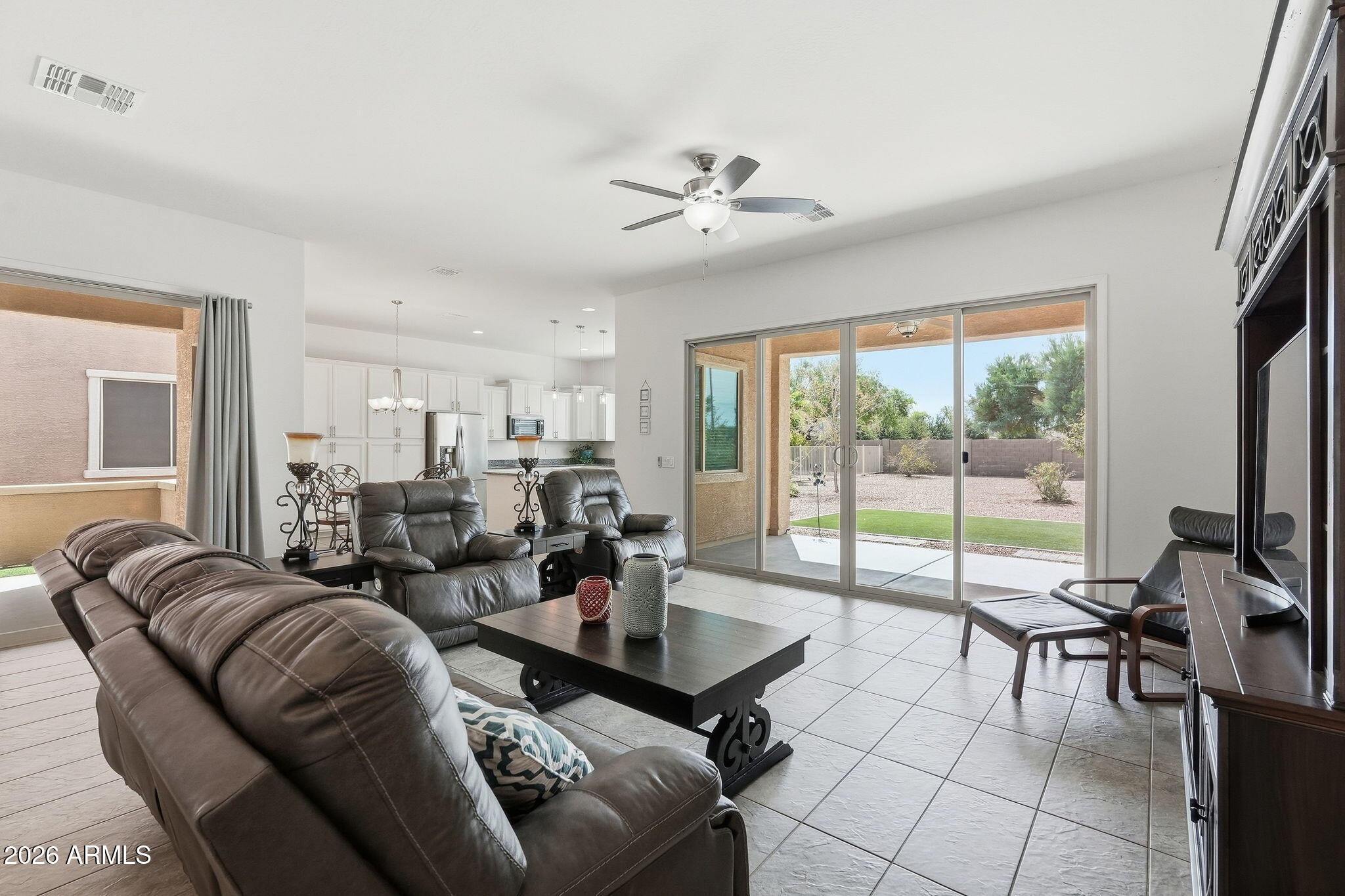 42851 West Mallard Road Maricopa, AZ 85138 - Photo 18 of 45 Living Room Open to 2 Patios