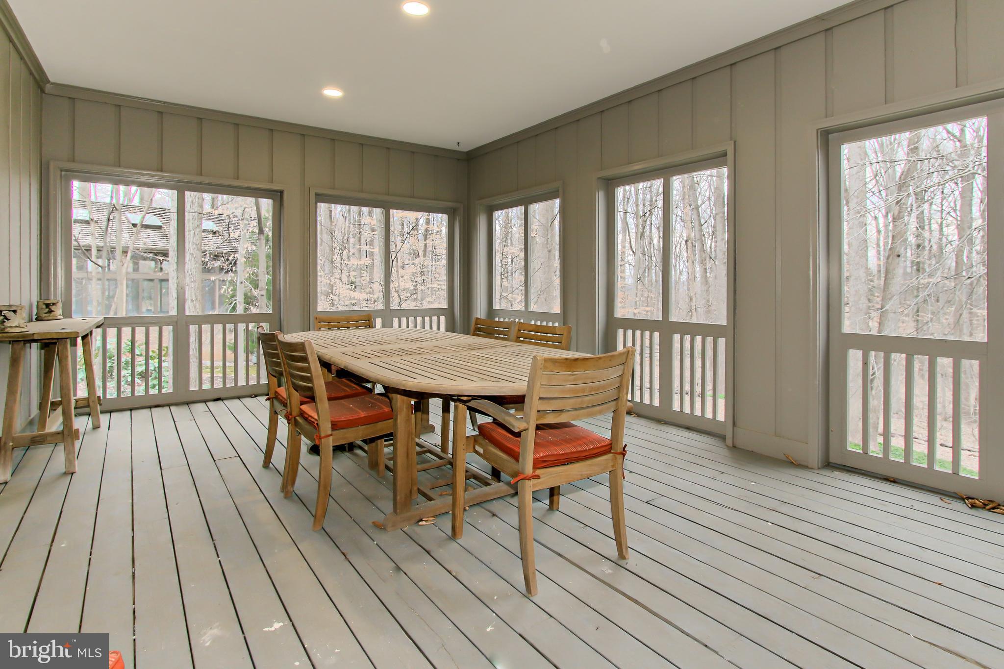 7600 Potomac Fall Road McLean, VA 22102 - Photo 9 of 29 Outdoor Dining on the Screened Porch