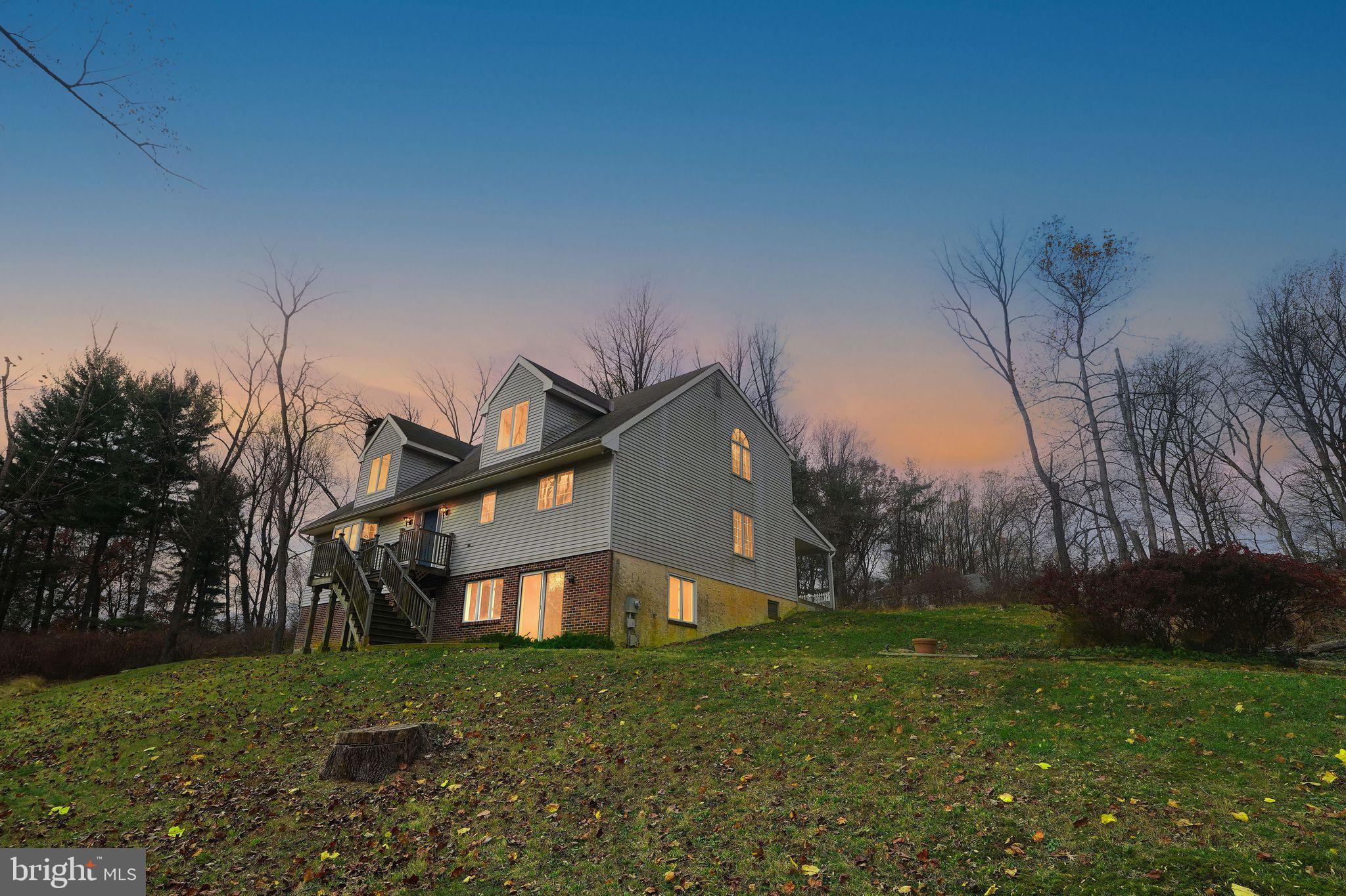 4350 Church Road Doylestown, PA 18902 - Photo 50 of 54 a front view of a house with a yard