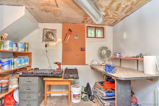 2536 Glencoe Street Denver, CO 80207 - Photo 15 of 26 a very nice looking room with a large window