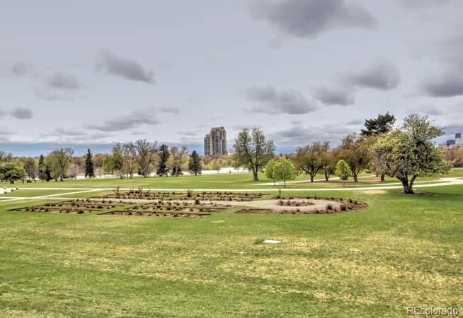 2536 Glencoe Street Denver, CO 80207 - Photo 24 of 26 a view of building with outdoor space and seating