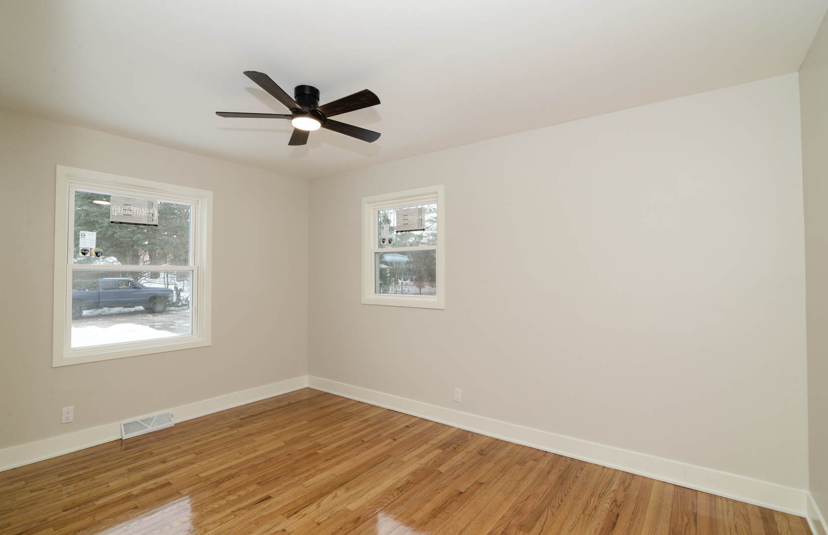 4818 Strong Road Crystal Lake, IL 60014 - Photo 13 of 31 a view of empty room with wooden floor and fan