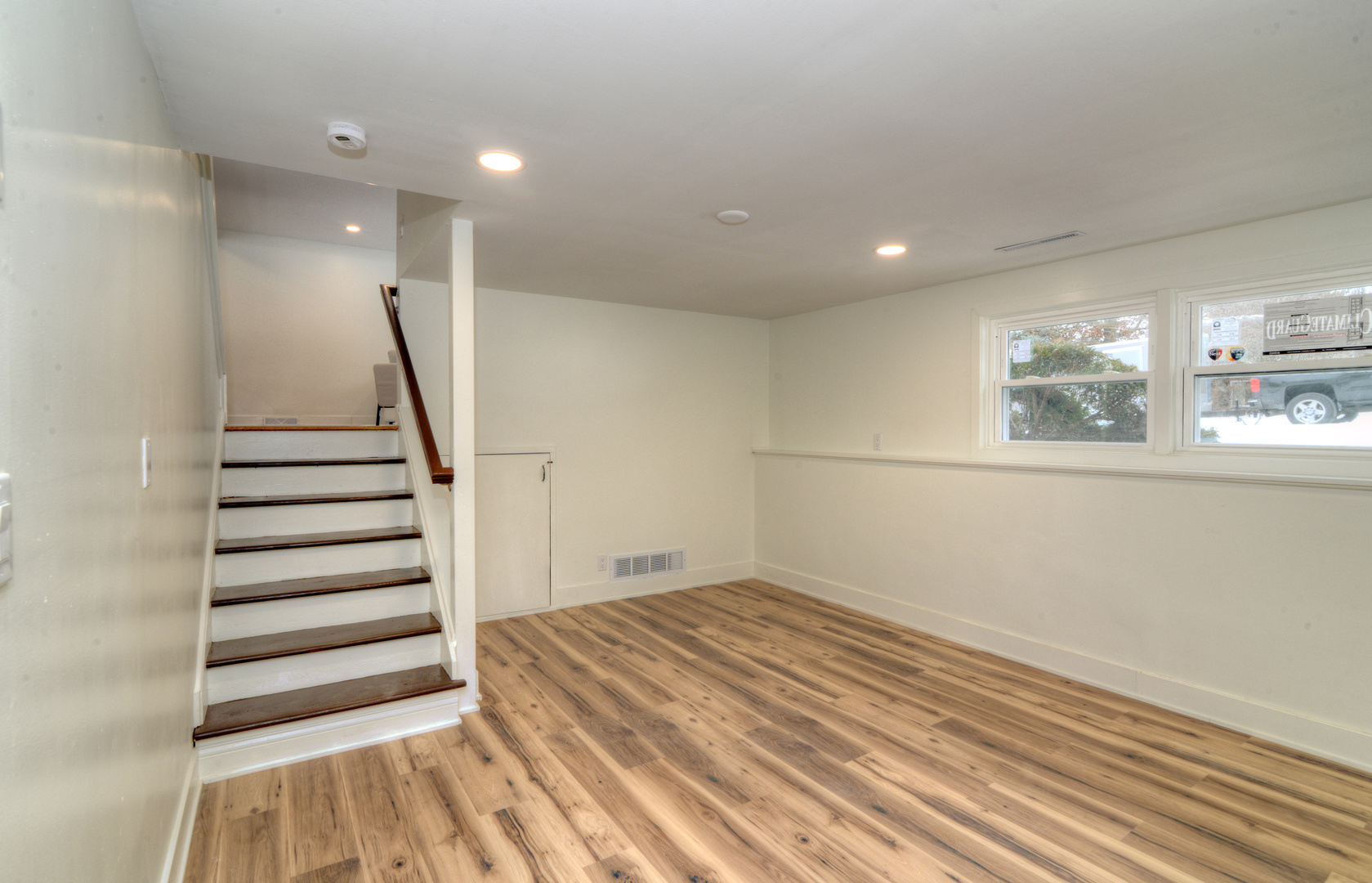 4818 Strong Road Crystal Lake, IL 60014 - Photo 20 of 31 a view of a room with wooden floor and stairs