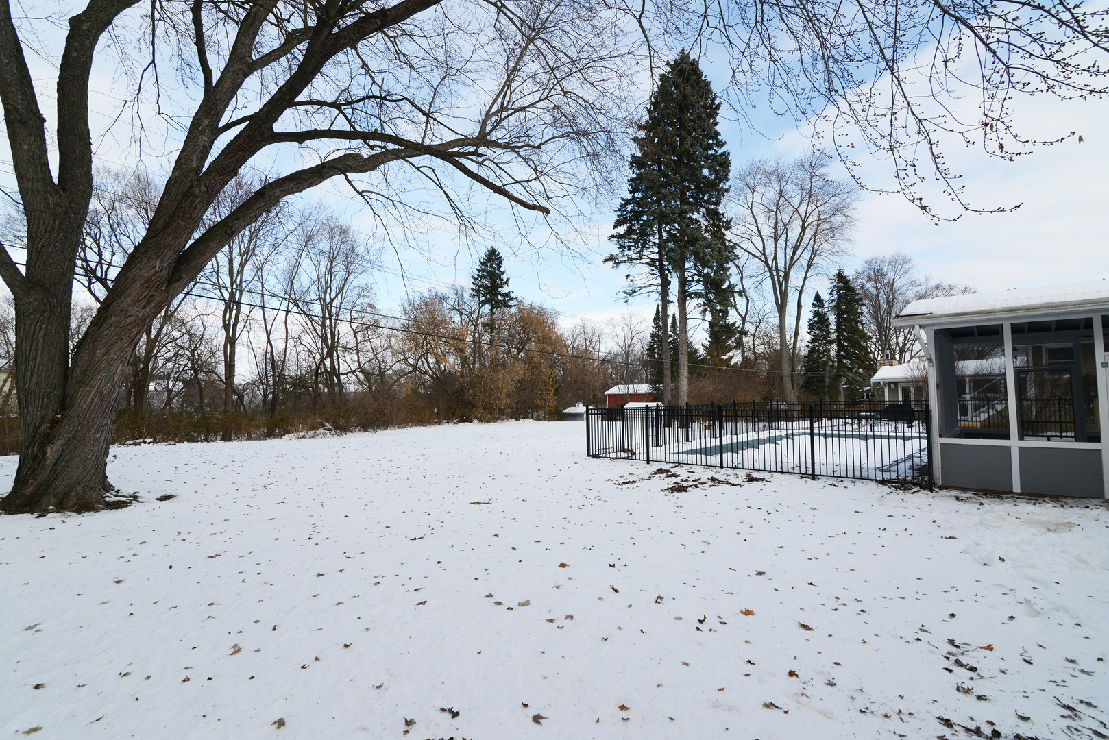 4818 Strong Road Crystal Lake, IL 60014 - Photo 24 of 31 a view of house with snow on the background