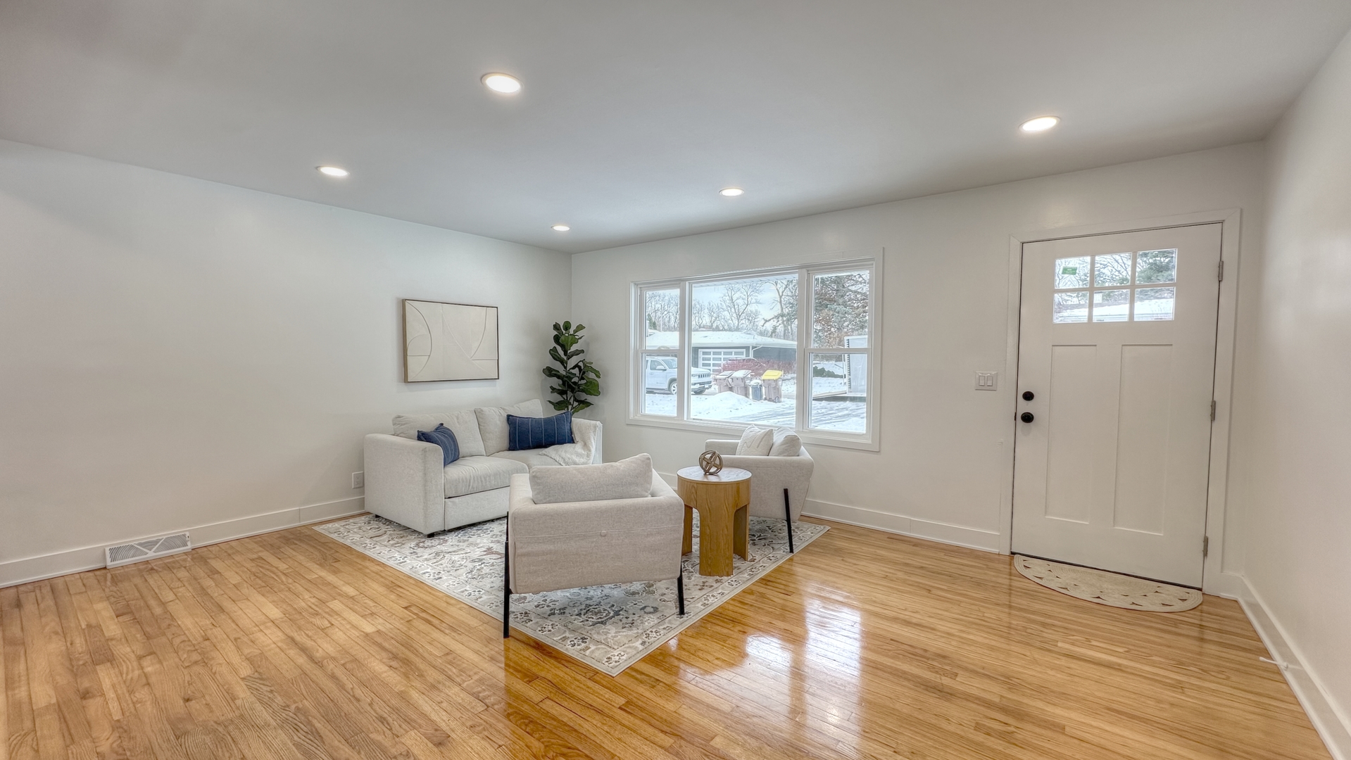 4818 Strong Road Crystal Lake, IL 60014 - Photo 4 of 31 a living room with furniture and a wooden floor
