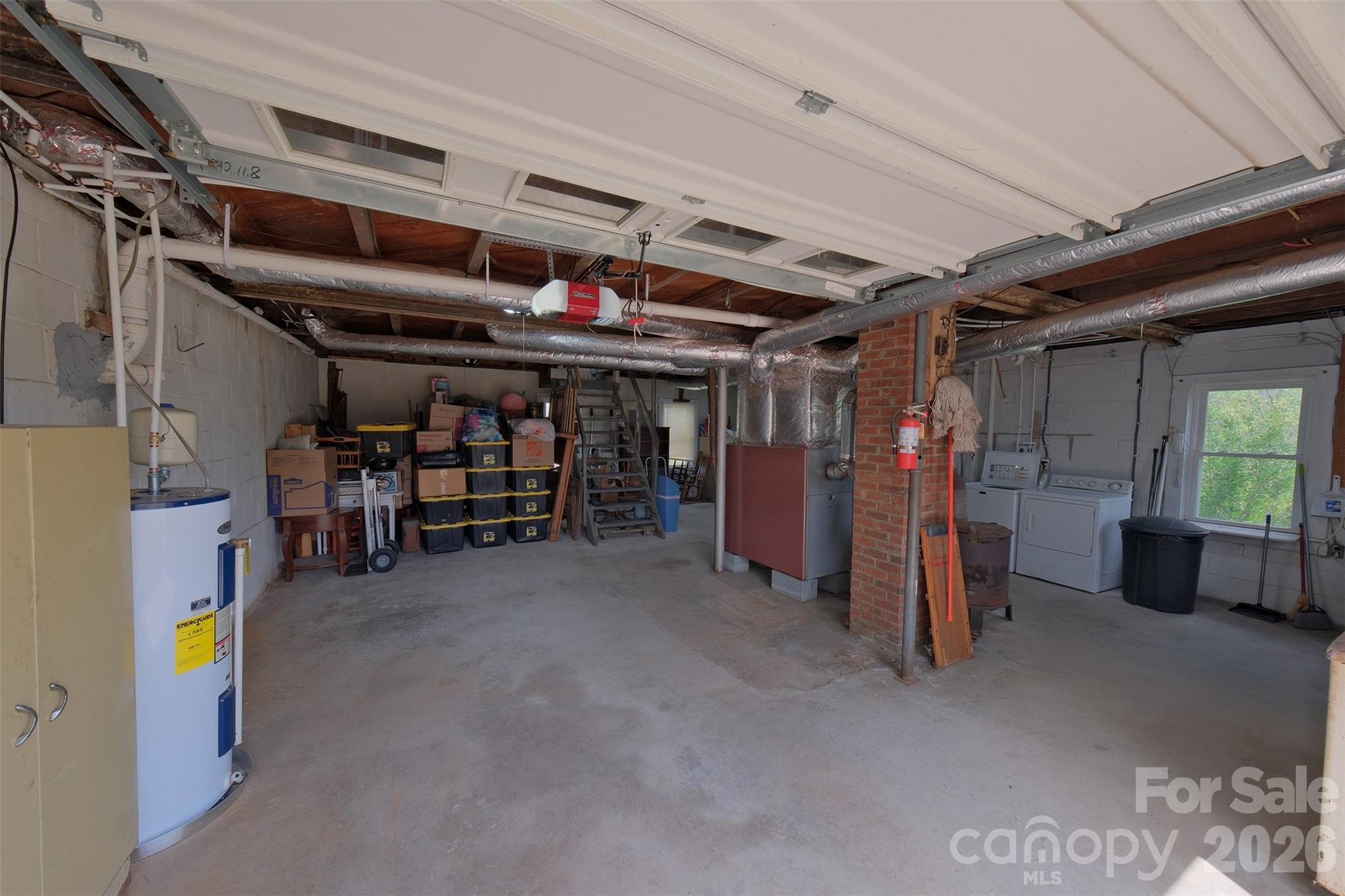 166 Spruce Street Canton, NC 28716 - Photo 15 of 23 a view of a storage room with racks