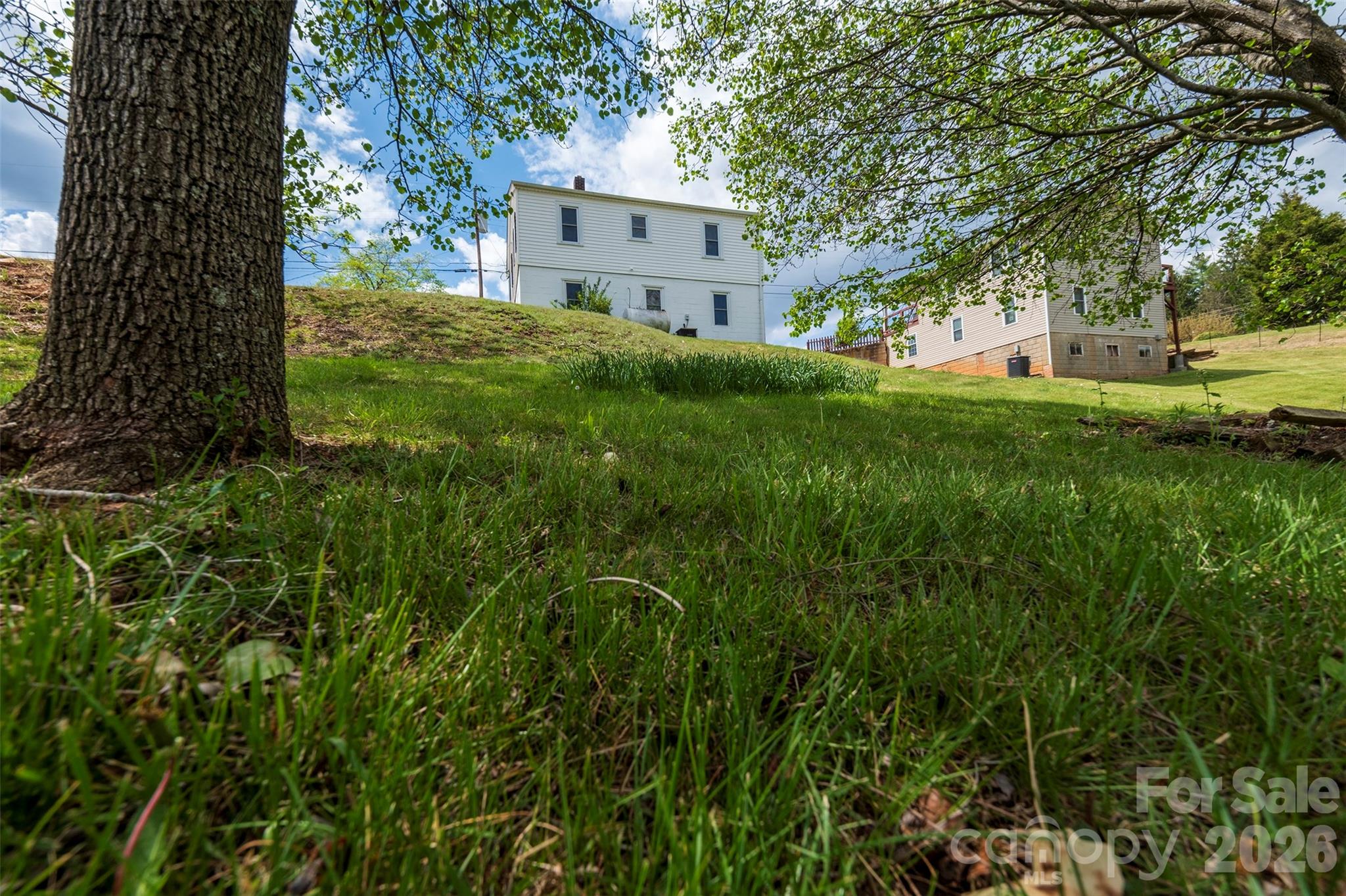166 Spruce Street Canton, NC 28716 - Photo 21 of 23 a view of a house with a yard