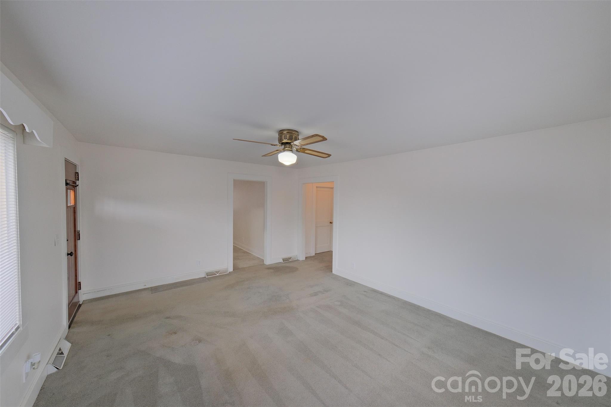 166 Spruce Street Canton, NC 28716 - Photo 6 of 23 wooden floor in an empty room