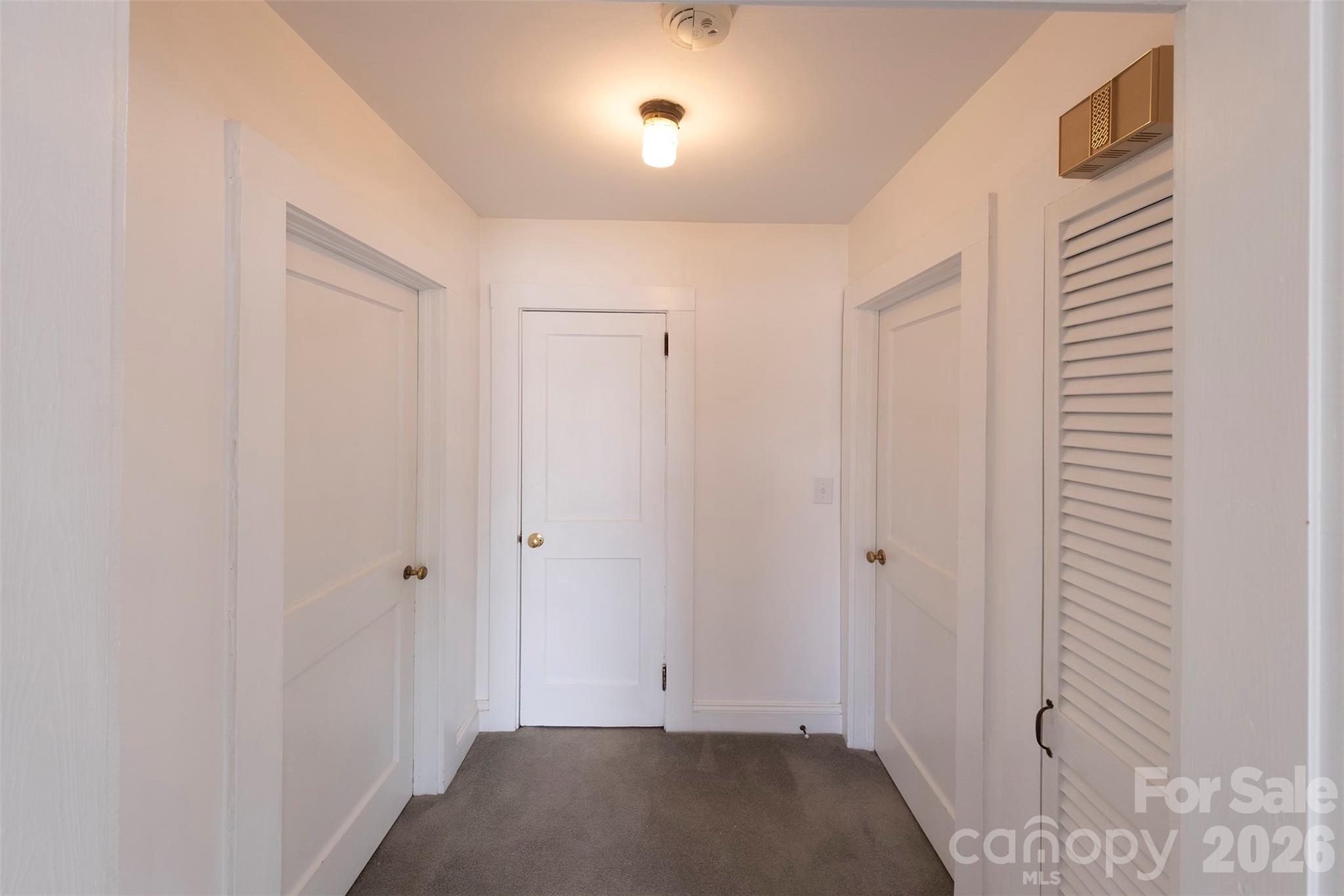 166 Spruce Street Canton, NC 28716 - Photo 10 of 23 a view of room with hardwood floor