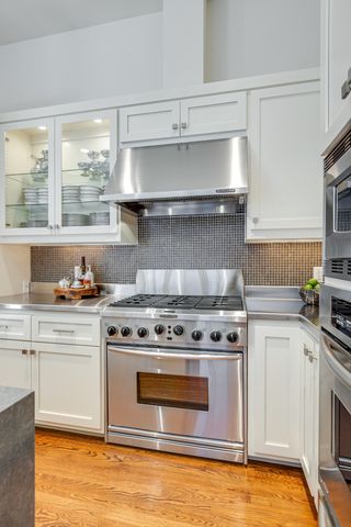 a room with furniture and wooden floor