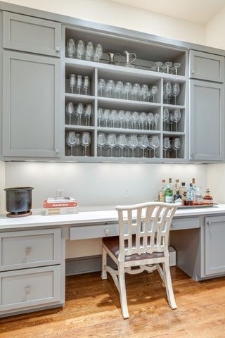 a view of walk in closet and window