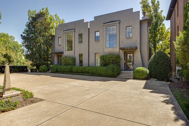 a building outdoor space with patio furniture