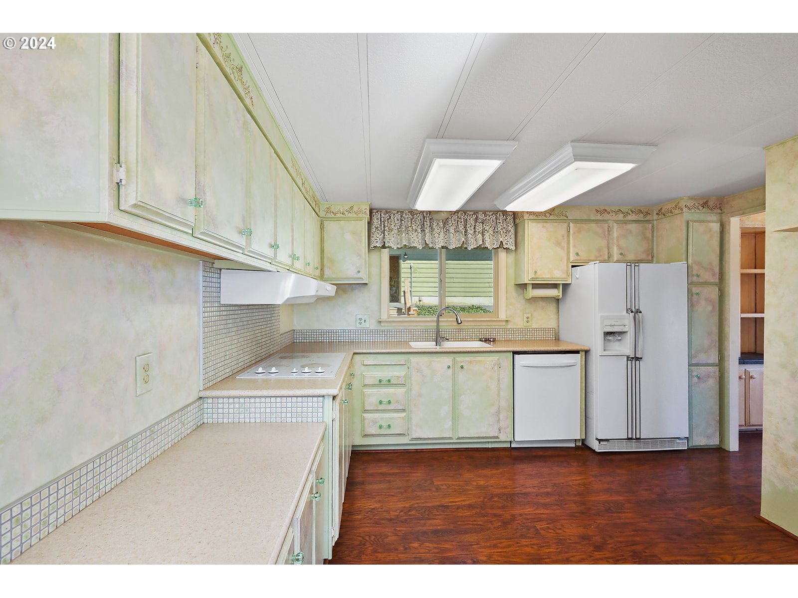 42 George Road Underwood, WA 98651 - Photo 15 of 45 a kitchen with a refrigerator and a sink