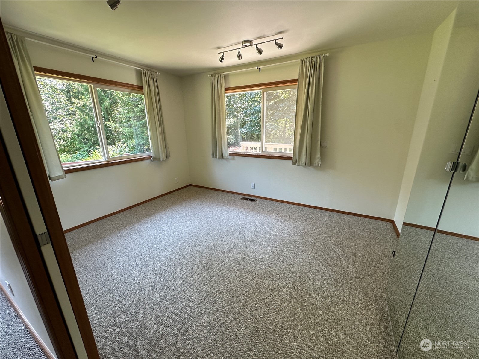 1893 Kelly Road Bellingham, WA 98226 - Photo 14 of 27 an empty room with windows