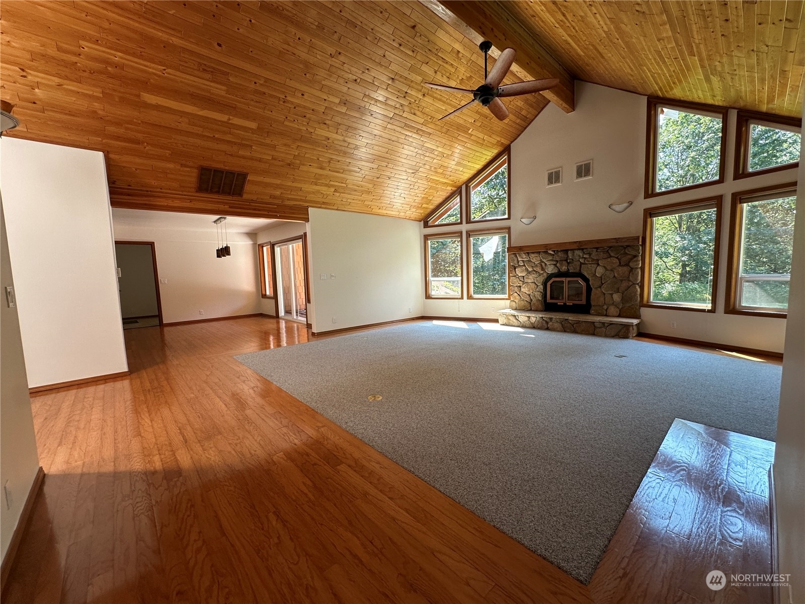 1893 Kelly Road Bellingham, WA 98226 - Photo 7 of 27 a view of an empty room with a fireplace and a window
