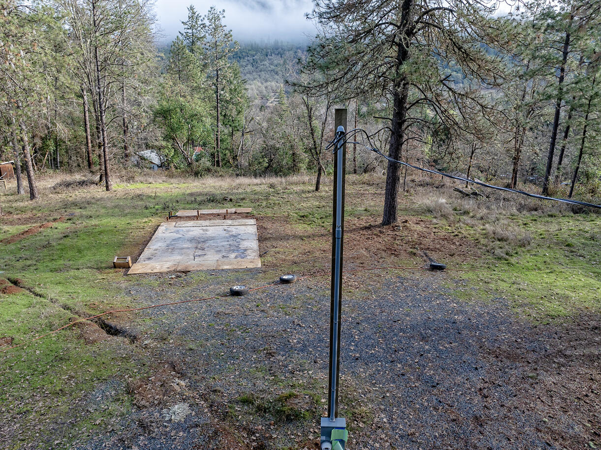 1329 West Evans Creek Road Rogue River, OR 97537 - Photo 16 of 23 a view of a yard with trees
