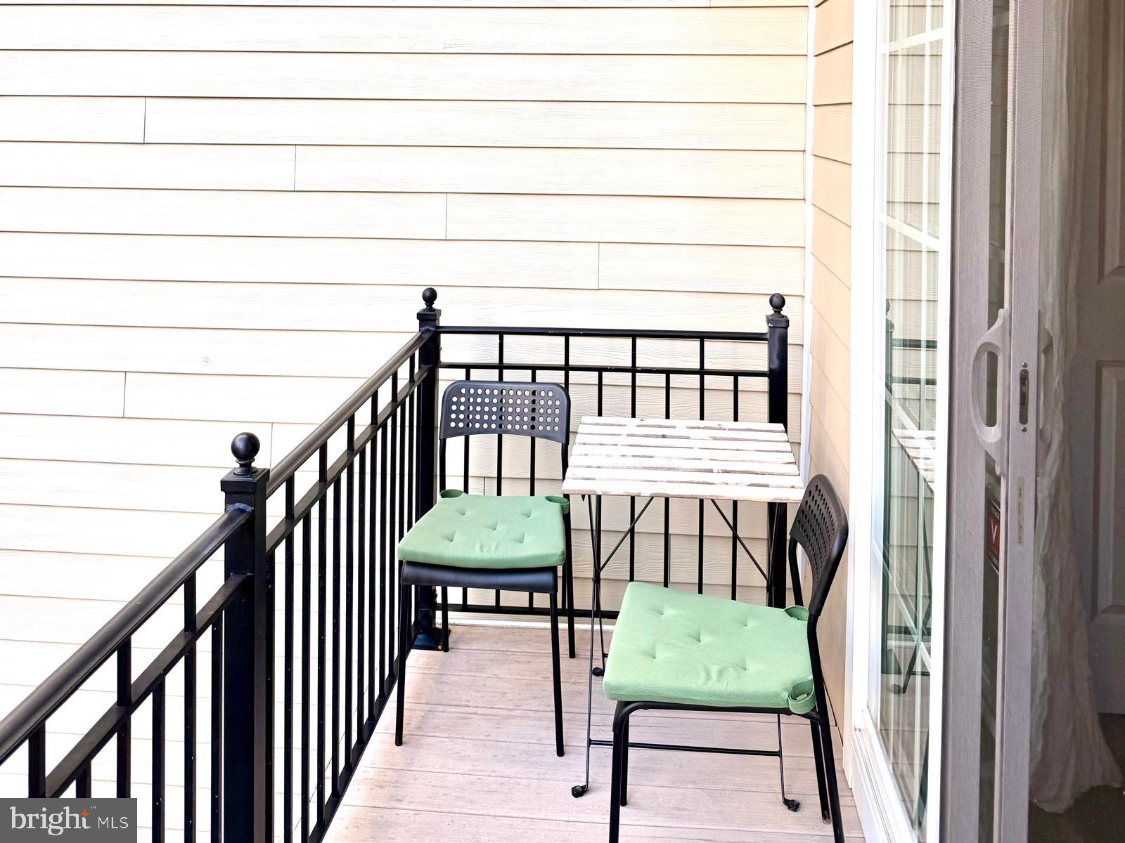 81 Linden Place Baltimore, MD 21286 - Photo 5 of 27 a view of a porch with furniture and wooden floor