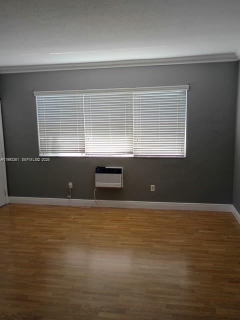 755 83rd Street, Unit 3 Miami Beach, FL 33141 - Photo 13 of 24 a view of wooden floor and kitchen space