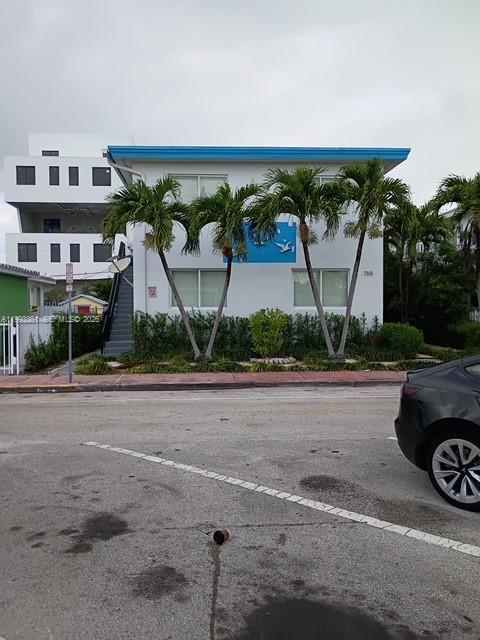 755 83rd Street, Unit 3 Miami Beach, FL 33141 - Photo 2 of 24 a front view of a house with garden