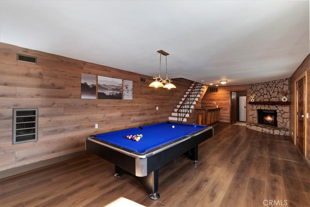 27814 North Bay Road Lake Arrowhead, CA 92352 - Photo 26 of 68 a room with pool table and a fireplace