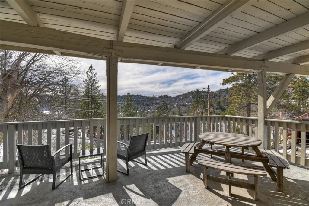 27814 North Bay Road Lake Arrowhead, CA 92352 - Photo 32 of 68 a view of a chairs in a balcony