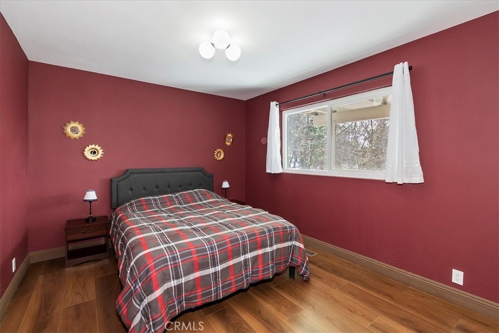 27814 North Bay Road Lake Arrowhead, CA 92352 - Photo 50 of 68 a bedroom with a bed and a workspace