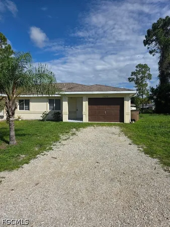 $1,195 | 2408 Joe Avenue South, Lehigh Acres, FL 33973