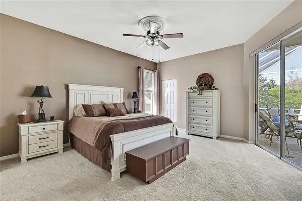 a bathroom with double vanity and a mirror