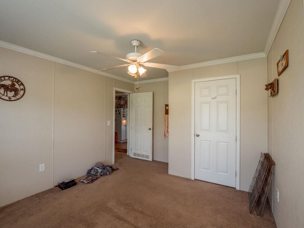 3676 Armstrong Road Springfield, TN 37172 - Photo 12 of 21 a view of a room with a hanging light and kitchen view
