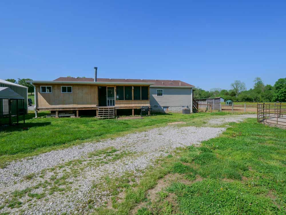 3676 Armstrong Road Springfield, TN 37172 - Photo 20 of 21 a view of a house with a yard