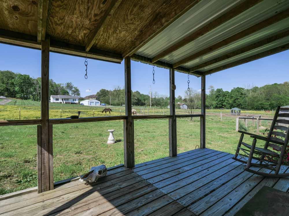 3676 Armstrong Road Springfield, TN 37172 - Photo 7 of 21 a view of balcony with wooden floor