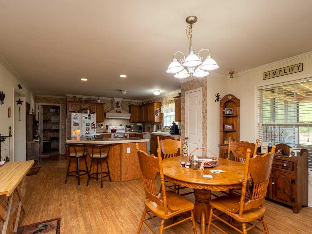 3676 Armstrong Road Springfield, TN 37172 - Photo 10 of 21 a view of a dining room with furniture window and wooden floor