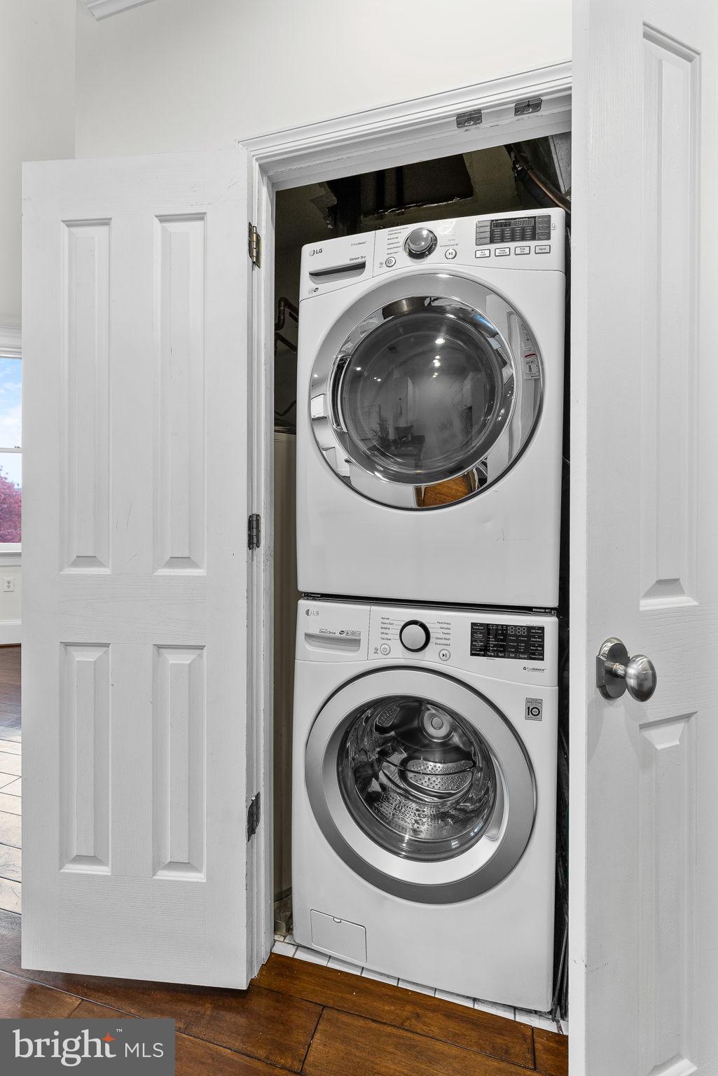 20 Logan Circle Northwest, Unit 33 Washington, DC 20005 - Photo 19 of 32 a utility room with dryer and washer