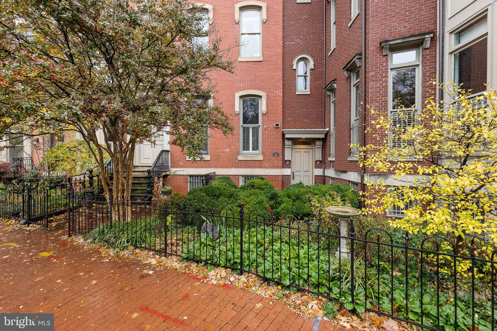 20 Logan Circle Northwest, Unit 33 Washington, DC 20005 - Photo 7 of 32 front view of house with a yard