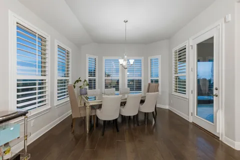 a kitchen with stainless steel appliances a sink stove and refrigerator