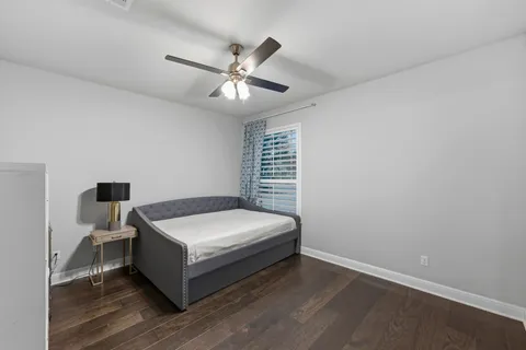a bathroom with a sink vanity and a mirror