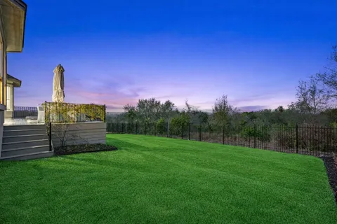 a view of swimming pool with outdoor seating