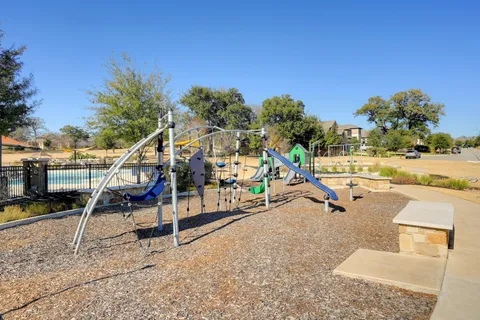a view of a patio with swimming pool table and chairs