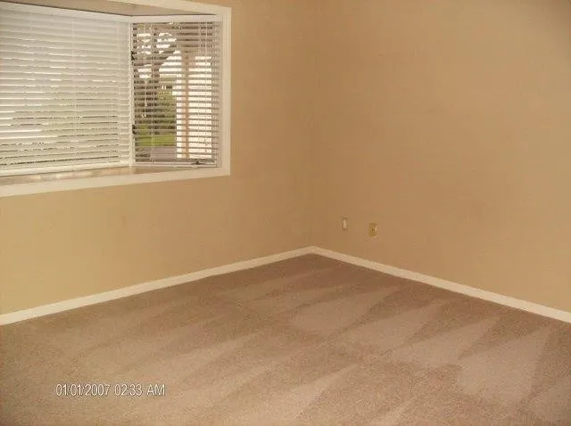 an empty room with a window