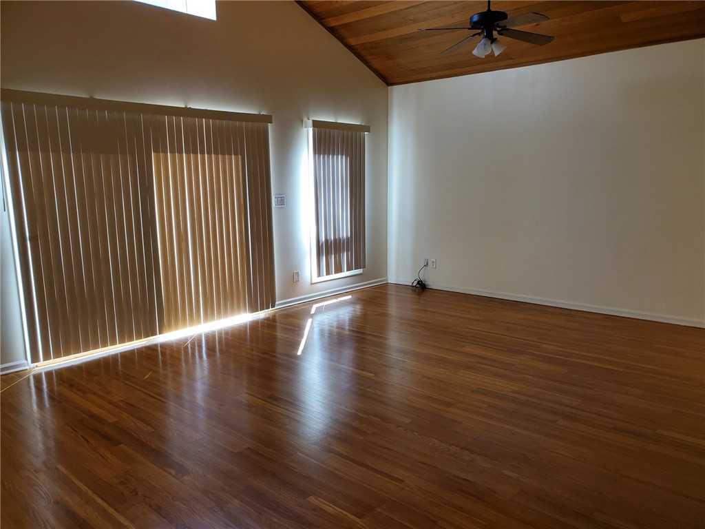 131 Peppertree Drive, Unit 21 Vero Beach, FL 32963 - Photo 6 of 25 a view of a livingroom with wooden floor